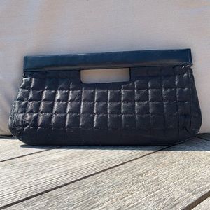 Small black satiny clutch